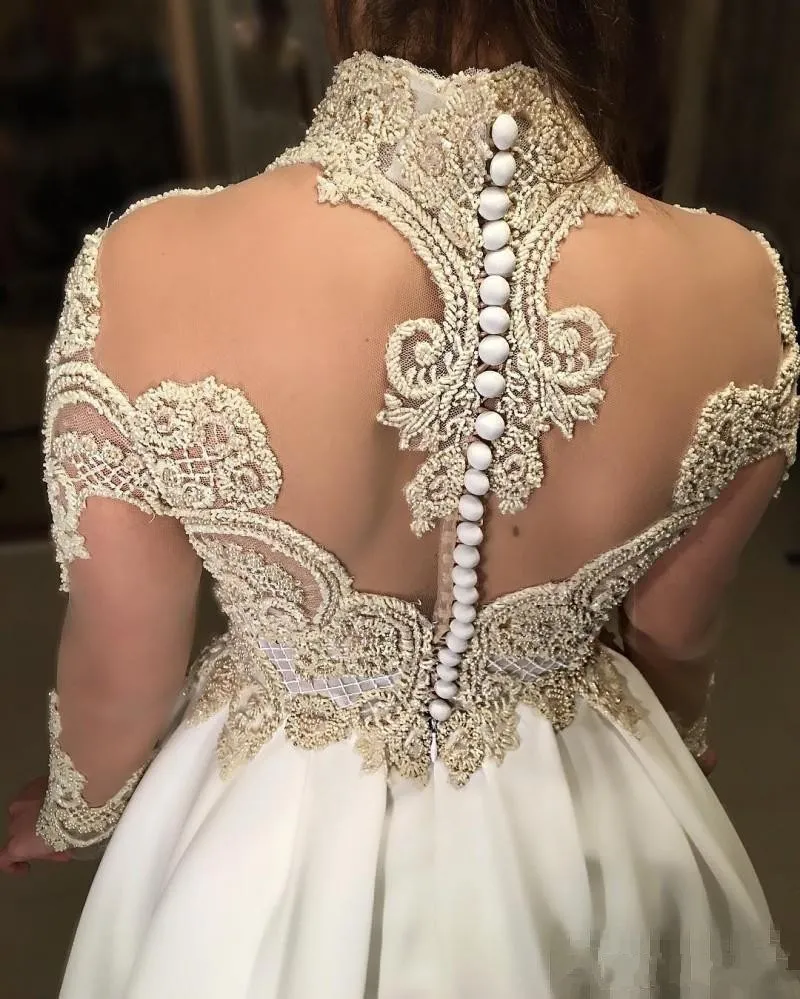 2017 Korta arabiska cocktailklänningar High Neck Illusion Crystal Beaded Sheer Back Button Långärmade Prom Klänningar Formella Homecoming Gowns