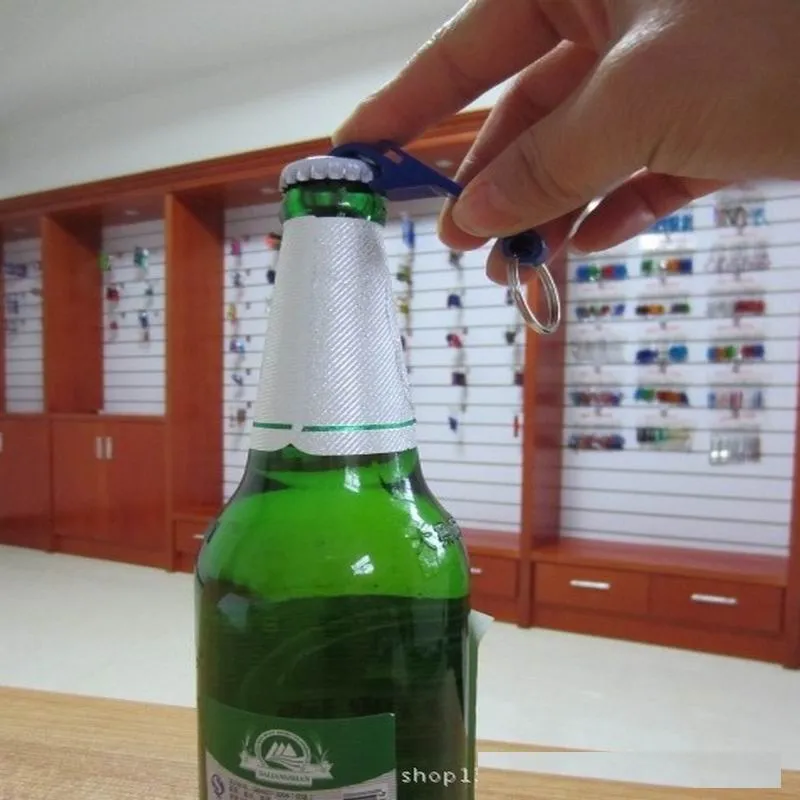 Preço de fábrica por atacado de metal abridor de garrafa de cerveja chaveiro homem moda chaveiro pingente encantos multifuncionais personalidade presente