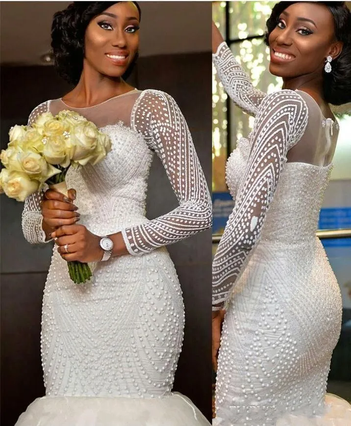 2018 Bling African Nigeria New Mermaid Wedding Dresses Jewel Neck Long Sleeves Crystal Beaded Pearls Sweep Train Custom Formal Bridal Gowns