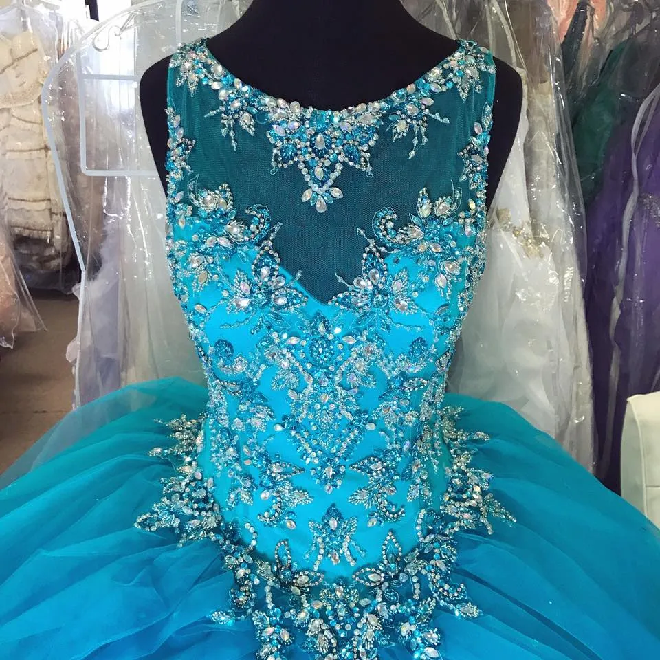 Robe de bal turquoise en tulle bleue avec robe de Quinceanera pure appliques de cristal dos nu plus la taille Douce 16 robes Robe de bal à lacets