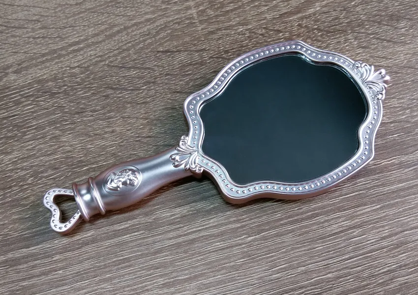 Vintage Plastic Hand Mirror For Cosmetics And Makeup Compact And