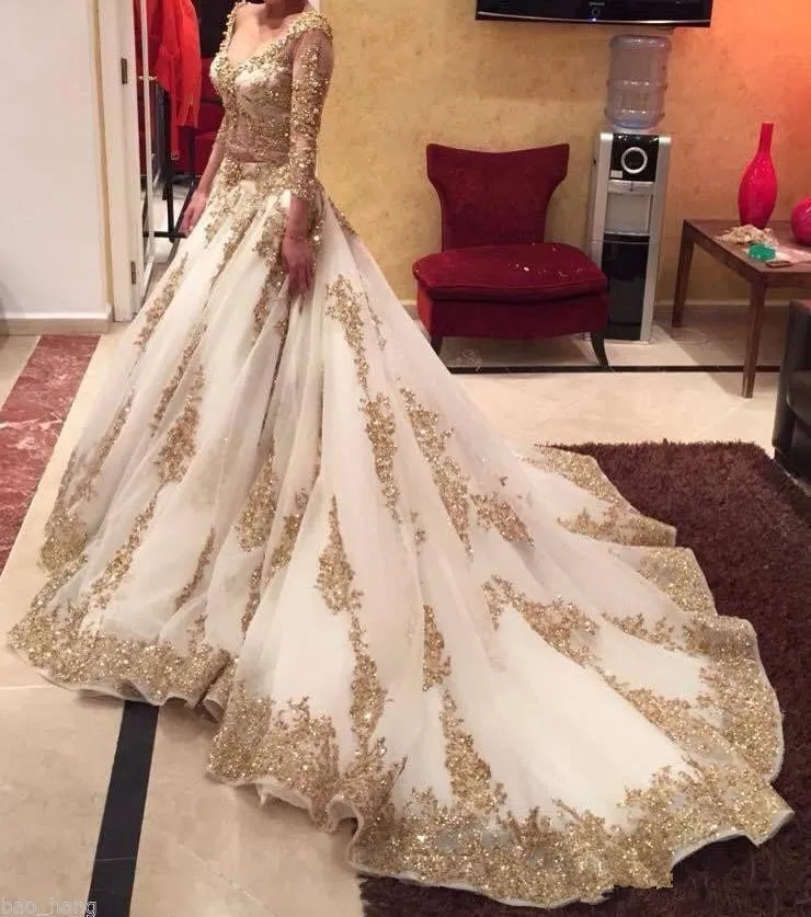 Vestidos de noche de dos piezas de estilo saudita mangas largas vestidos de noche de ilusión sexy apliques de abalorios de oro vestidos de novia 2016
