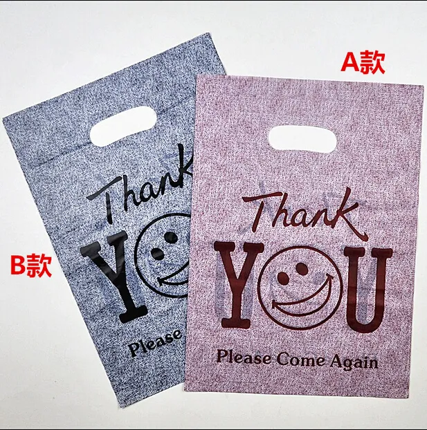 All'ingrosso-200pcs / lot "grazie" Sacchetti di imballaggio utili riciclabili in plastica stampata Shopping Borsa a mano Protable Boutique Gift Carrier