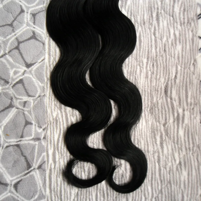 Colore # 1 Jet Black Brasiliano Capelli dell'onda del corpo Estensioni dei capelli del nastro dei capelli umani 40 pezzi capelli di trama della pelle dell'unità di elaborazione 100g estensioni dei capelli del nastro ondulati