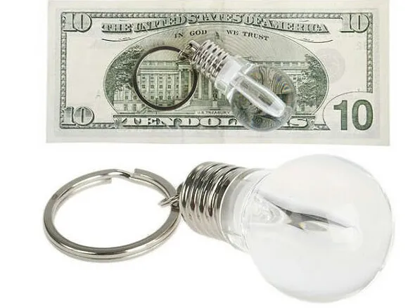 billig nyhet LED glödlampa formad ring nyckelring ficklampa Färgrik mini-lampor lampa