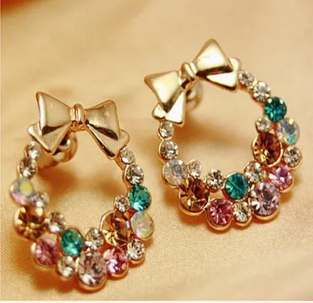 Personlighet Mode Smycken Örhängen Rhinestone Wreath Bowknot Stud Alloy Örhängen för Kvinna