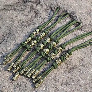 de 50 breloques en métal dragon léopard pour bracelet paracorde, lanières de couteaux, accessoires 291J