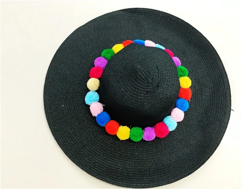 Wide brim sun hat with pom pom sun protection straw beach caps available 