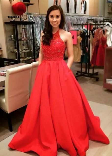 Stunning Red Prom Dresses A Line Halter Sleeveless Exquisite Beaded Top Satin Evening Party Gowns with Pockets