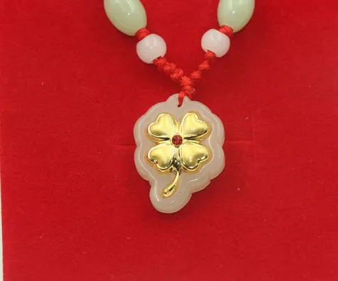 Gold inlaid jade lucky pendant A clover necklace and pendant (sifang to gain)