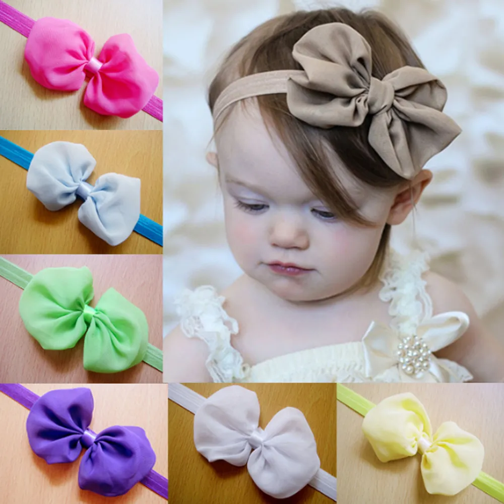 12 colori Nuovo infantile del bambino chiffon bowknot fascia 6 mesi-3 anni del bambino elastico Hairband Accessori per capelli di colore solido