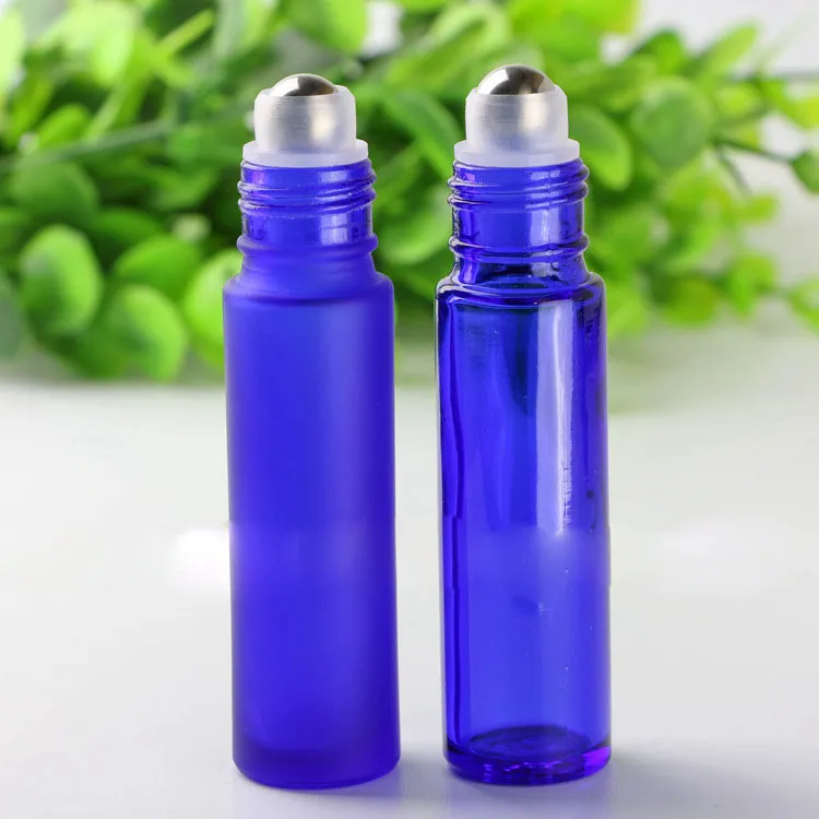 Bottiglie di olio essenziale di vetro blu smerigliato da 10 ml all'ingrosso balsamo le labbra con bottiglie di rullo a sfera in metallo in acciaio inossidabile e tappi d'argento