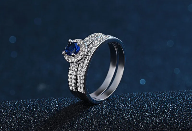 Anelli di fidanzamento in argento puro originali Yhamni impostati rotondi WhiteBlue CZ Diamond Fedi di nozze fissate donne Kenr0428480406