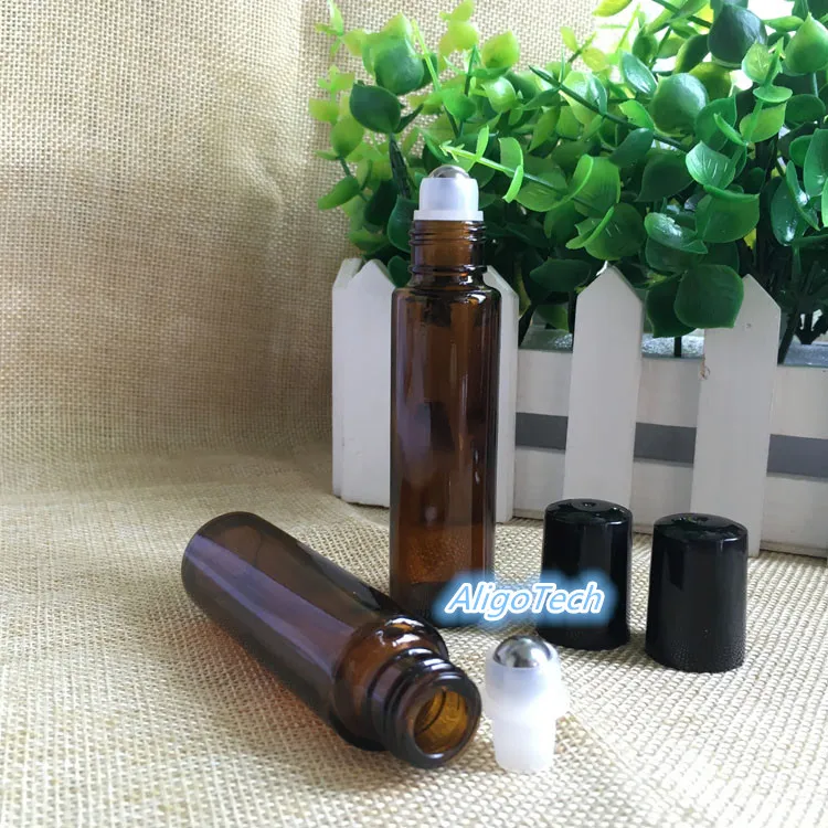 600 sztuk / partia Amber Glass Roll On Bottle 15ml 1 / 2oz Essential Oil Pusty Aromaterapia Perfumy Butelka 15ml z metalową piłką DHL DHL