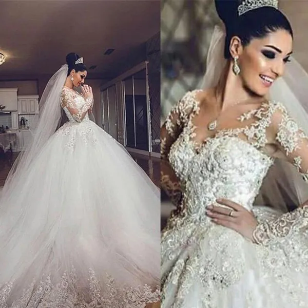 Luxury Arabic Ball Gown Wedding Dresses Sweetheart V Neck Puffy Bridal Gowns Illusion Lace Appliqued Long Sleeves Tulle Skirt Brides Wear