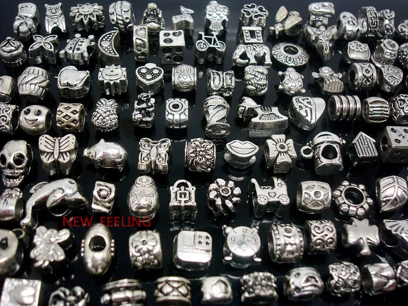 100 unids mezclado perlas de plata del Tíbet para la fabricación de joyas de aleación suelta encantos de metal diy granos del agujero para la pulsera europea al por mayor a granel precio bajo
