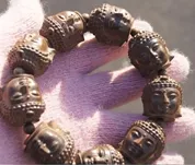 Mão-esculpida - Rosewood pequeno da folha Buddha cabeça (budismo tibetano) rosário, corda de cordas de borracha, bracelete frisado do encanto