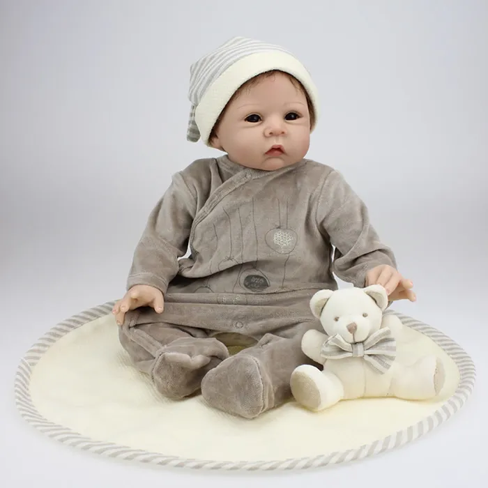 Realistyczne 22-calowe tkaniny Doll Body Miękkie Silikonowe Kończyny Kolekcja Reborn Baby Can Kłama I Siedząc Zabawki Noszenie Nakrycia głowy