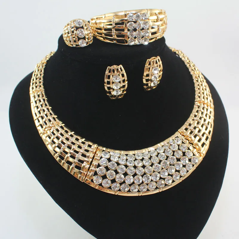 Ställer in kvinnor afrikanska smycken set 18k guldpläterad full strass halsband örhänge armband ringar bröllopsfest smycken smycken
