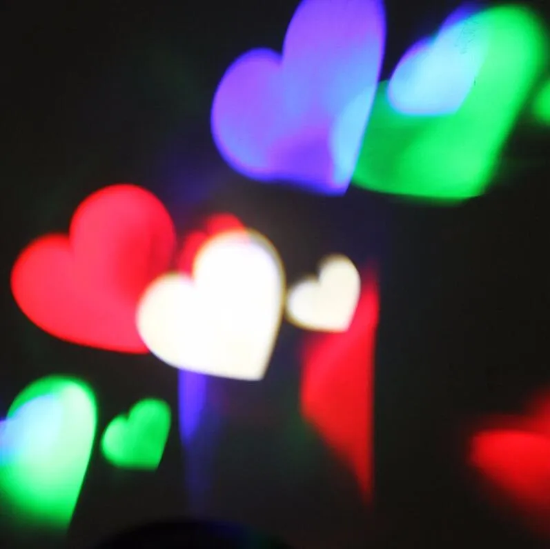 Efectos LED Luces navideñas navideñas Lámparas de proyector láser Luz de escenario Corazón Copo de nieve Fiesta Paisaje Luz con 2 lentes reemplazables