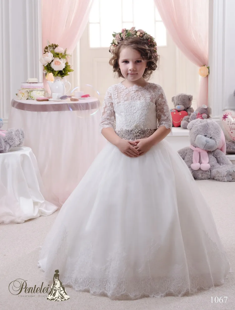 2016 Kinder Brautkleider mit langen Zug und halben Ärmeln Spitze Appliques schöne Blumenmädchen Kleider mit Perlen Schärpe und Bögen