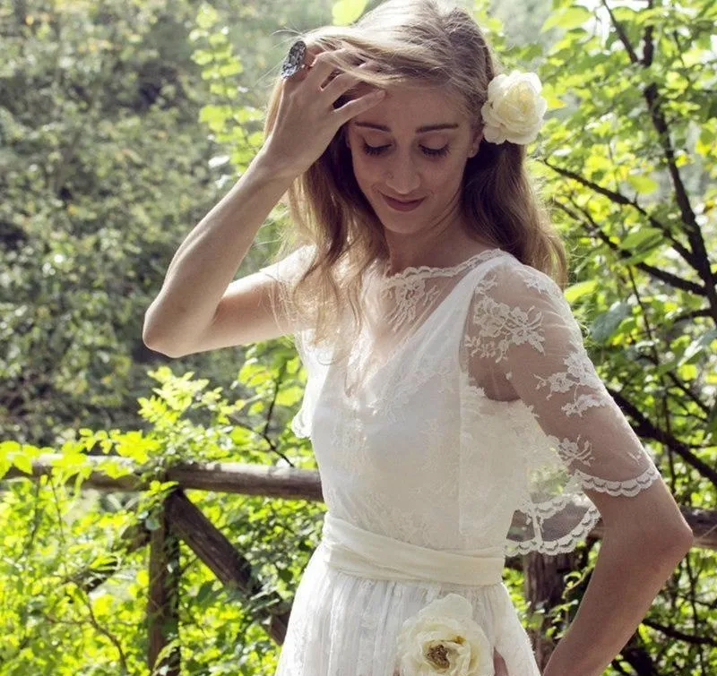 Bohemian Lace Boho Lace Wedding Dress with Half Sleeves, Sheer Detailing, and Sweep Train - Perfect for Beach or Maternity Bridal Gowns