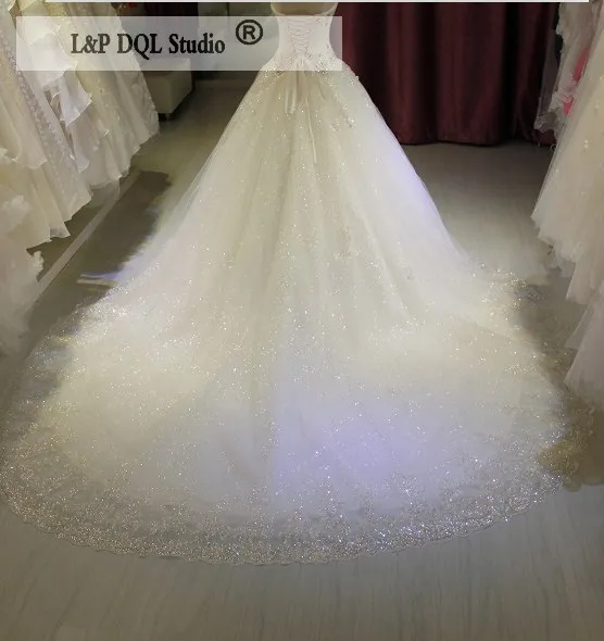 아이보리 볼 가운 웨딩 드레스 Applique Crystal Plus Cide Bridal Gowns Court Train이 장착 된 Tulle Organza