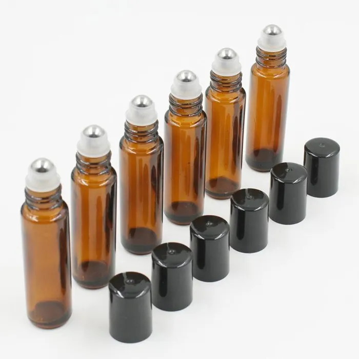 Botellas de aceite esencial de vidrio grueso marrón con bola de rodillo de Metal de acero 720 unids/lote