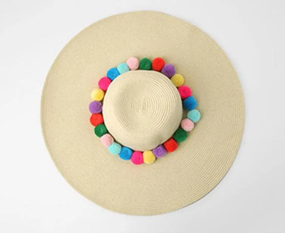 Wide brim sun hat with pom pom sun protection straw beach caps available 