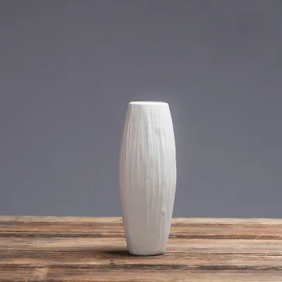 Céramique Creative Fashion Vase blanc Vase de haute qualité Modern Simple Porcelaine Living Room Decoration Fayshings 3N0119512100