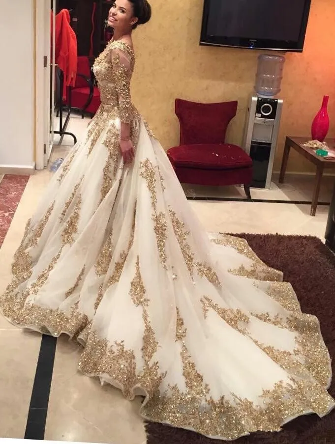 Vestidos de noche de dos piezas de estilo saudita mangas largas vestidos de noche de ilusión sexy apliques de abalorios de oro vestidos de novia 2016