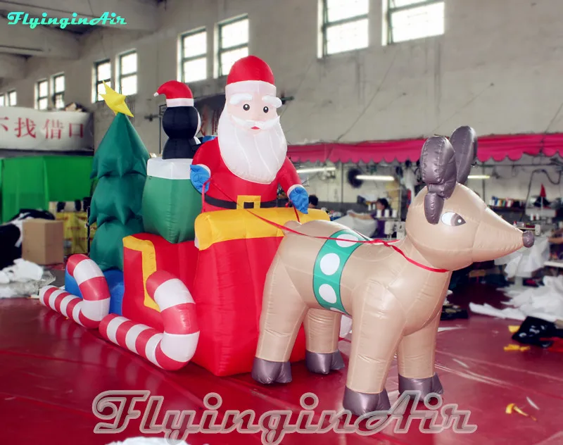 Père Noël gonflable en traîneau de Noël de 6 m avec traîneau à rennes et pingouins