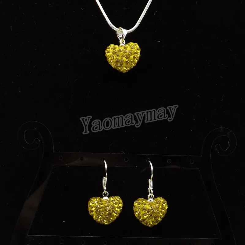 Regalo de año nuevo en forma de corazón Conjunto de joyas de diamantes de imitación Pendientes de cristal amarillo y collar 5 conjuntos al por mayor Envío gratuito