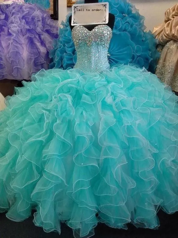 2016 Sweetheat Bling Quinceanera Suknie Ball Suknia Kryształowa Frezowanie Glitter Niebieskie Długie Ruffles Wielopięciowe Słodkie 15 Party Prom Suknie Wieczorowe