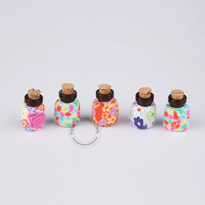 20 x Nuovo arrivo 2ml Mini bottiglia di vetro ambrato + Fiore Desigh Argilla polimerica Decorato Campione Display Vaso Colori diversi a caso