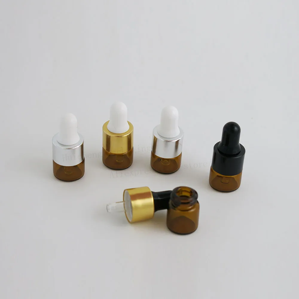 100 x 1 ml Amber Small Glass Dropper Flaskor för eterisk oljepfym Provtagning Tiny Portable Containers Mini Parfym Drop-flaskor