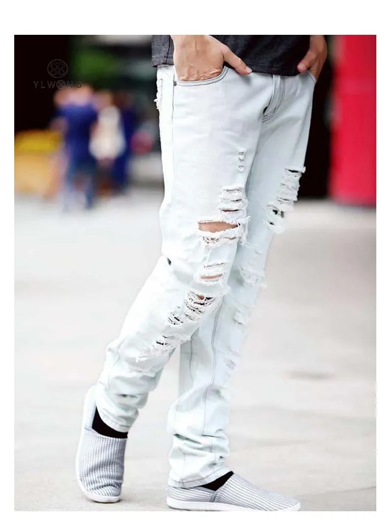 Pantaloni strappati ragazzo sale