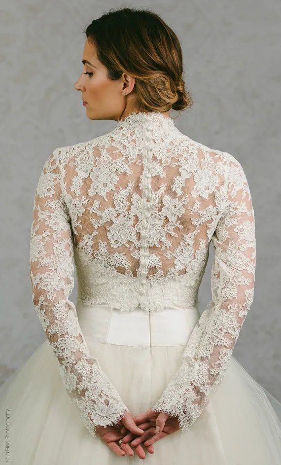 2018 Bolero Mantella in pizzo da sposa maniche lunghe Avvolgere da sposa Giacche applicate Mantelle da sposa Avvolge Giacca Bolero Abito da sposa Avvolge Plus Size