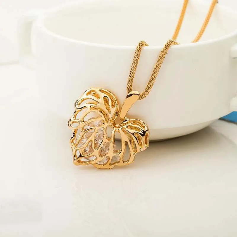 Hollow gold love leaf with shiny zircon necklace pendant Long necklace Alloy Gold Silver Sweater chain ornaments Clothing accessories
