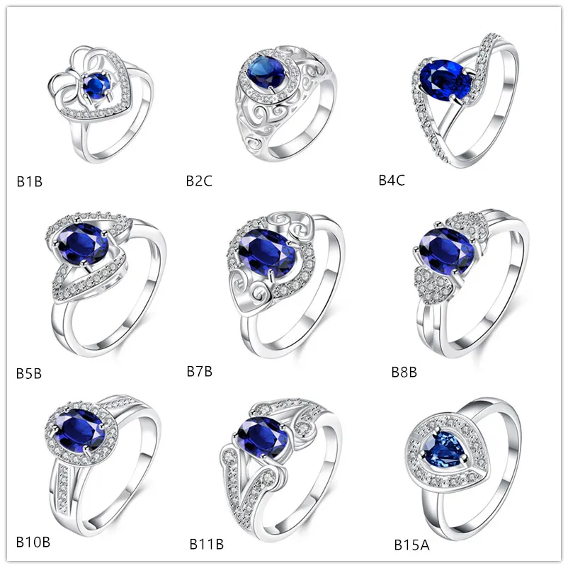 Gemischter Stil, hochwertiger, modischer Ring aus 925er Silber mit blauen Edelsteinen EMGR8, geformte Flügel, herzförmiger Ring aus Sterlingsilber, 10 Stück im Lot