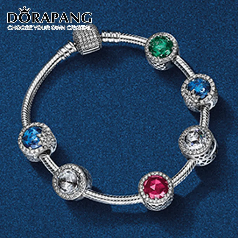 Dorapang 100% 925 Sterling Silver Armband Clear CZ Charmen av säkerhetsklämmor Pärlpassning Hängsmycke DIY Armband Set grossist