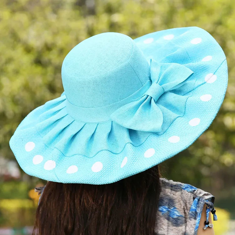 Mode grote rand strand hoed dots zon stro boog-knoop hoed voor vrouwen zomer caps opvouwbare gratis verzending