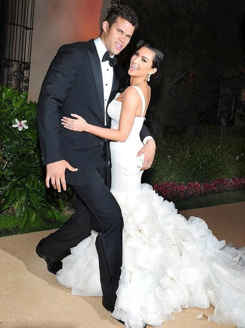 Kim Kardashian 2018 Nuovo abito da sposa Sexy Spaghetti Strapls Organza Ruffle Sirena Sagomato Lunghezza pavimento Hi-Lo Abiti da sposa