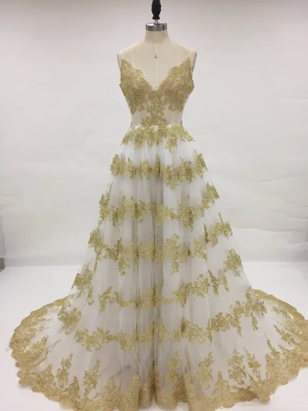 Superbes robes de mariée ivoire et or Une ligne bretelles spaghetti robe de mariée colorée Sparkly Gold Lace Appliques Corset Retour robe de mariée