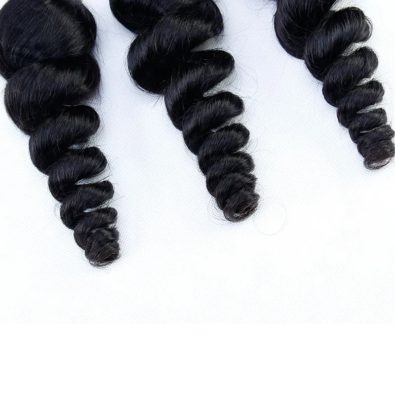 Brazilain Virgin Hair Losse Golf Menselijke Bundels met Sluiting Goedkope Menselijke Haar Weefs Weave Extensions met Sluiting Natuurlijke Kleur Haarverkopers