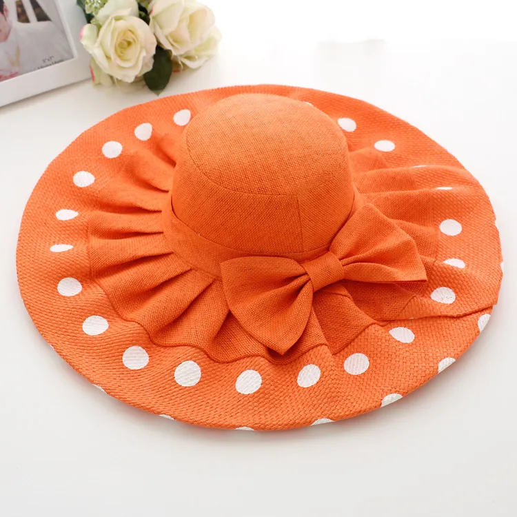 Mode grote rand strand hoed dots zon stro boog-knoop hoed voor vrouwen zomer caps opvouwbare gratis verzending