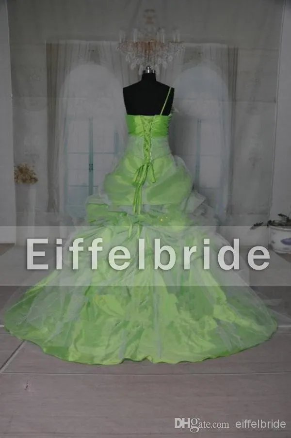 Maßgeschneiderte Sweet-16-Kleider, Ballkleider, sexy Spaghettiträger, schöne weiße Spitzenapplikation, grüne Blumen, Rüschen, Prinzessin-Quinceanera-Kleid