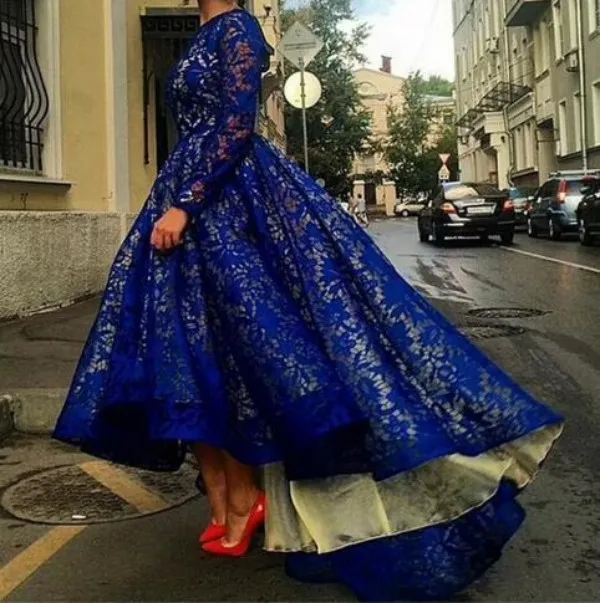 Royal Blue Lace Evening Gown: High-Low Illusion Dress, Long Sleeves. Shop Now! from Dhgate Evening Dresses - price 145.73 Royal Blue Lace Evening Gown: High-Low Illusion Dress, Long Sleeves. Shop Now! from Dhgate Evening Dresses - price 145.73