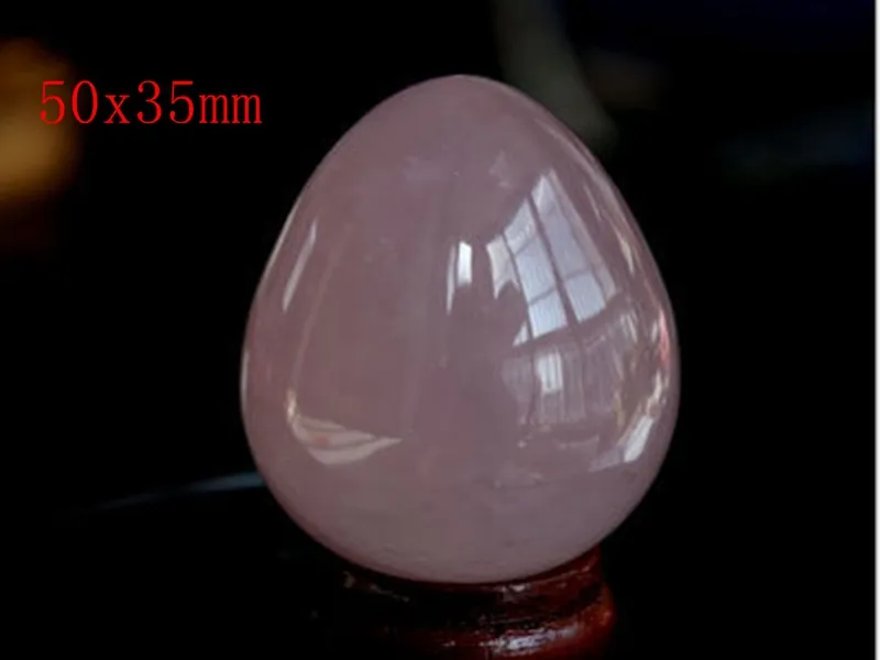 Gratis frakt 50x35mm Borrad Natural Rose Quartz Jade ägg för kvinnor Hälso- och sjukvård Yoni Egg Kegel Övning Yoni ägg med påse