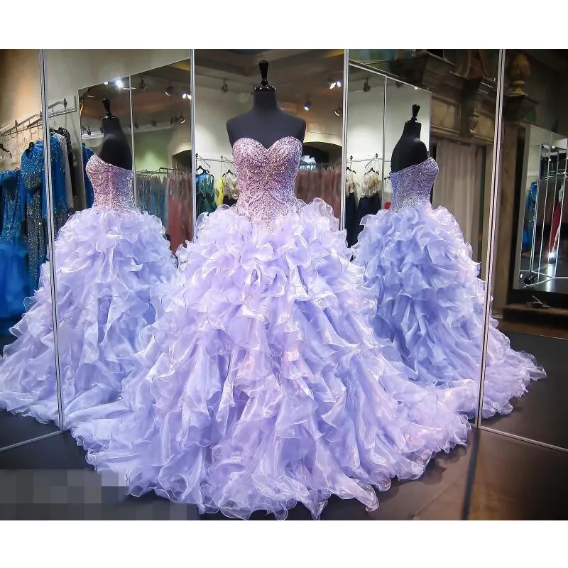 Ruffles Ball Gown Prom Dresses Lunghi paillettes con perline pesanti Top Corsetto Quinceanera Womean Abiti da spettacolo di bellezza Foto reali Lavanda Organza